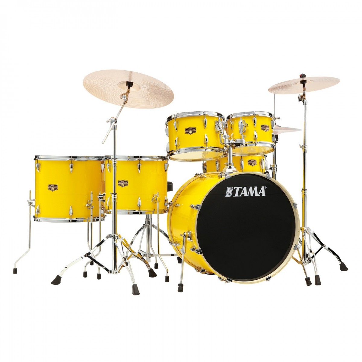 Yellow Tama drum set on a white background